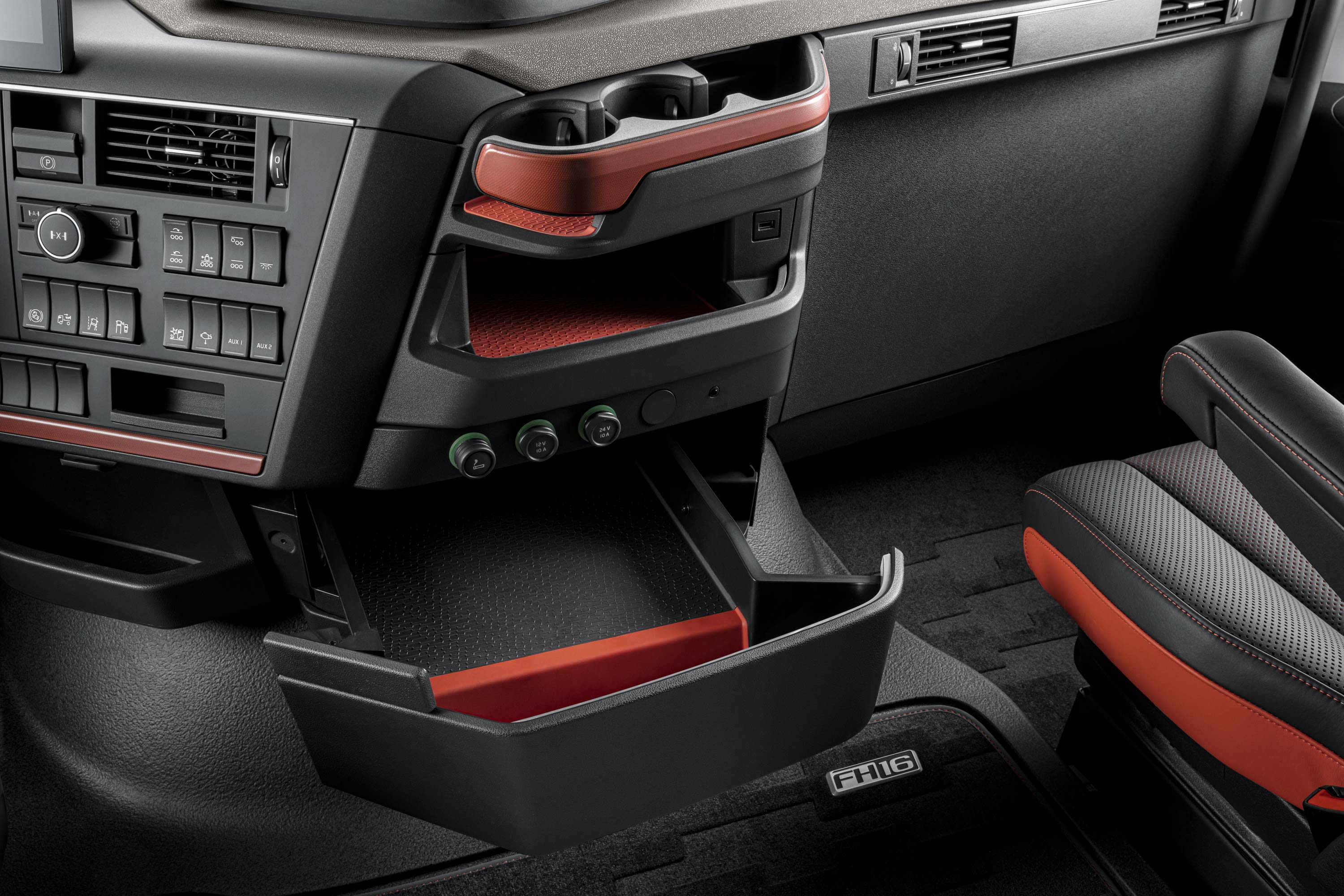 Convenient storages accessible from the Volvo FH16 driver seat.