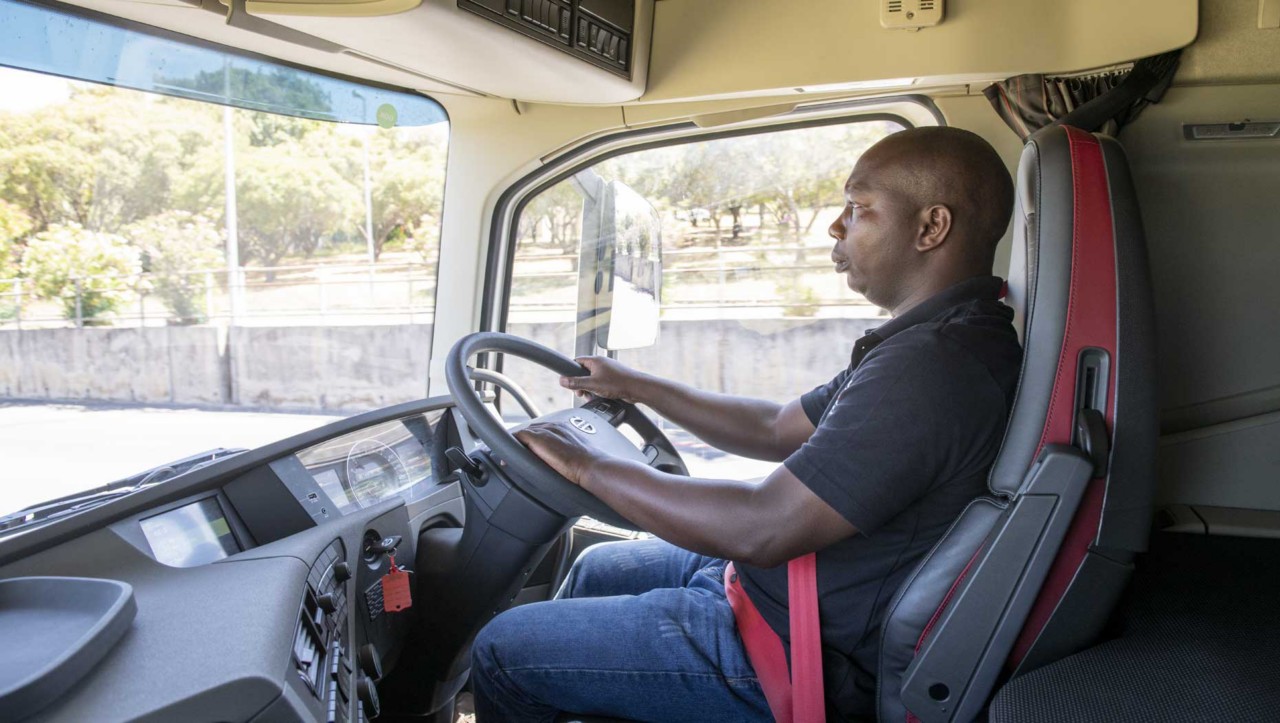 Kudzai Mwoyondewenyu, an ATS driver in the truck cab